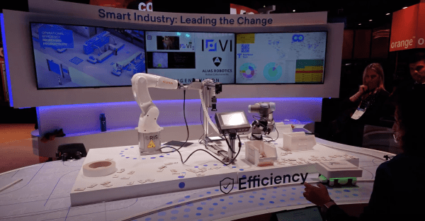 A functional model of a robotic AI-enhanced production line on display at the Mobile World Congress in Barcelona — MWC24, MWC 2024, GSM World Congress, Fira Barcelona 